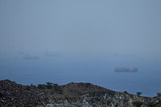 Tankers and bulk carriers anchored in the Strait of Hormuz, Saturday, 18 April 2026